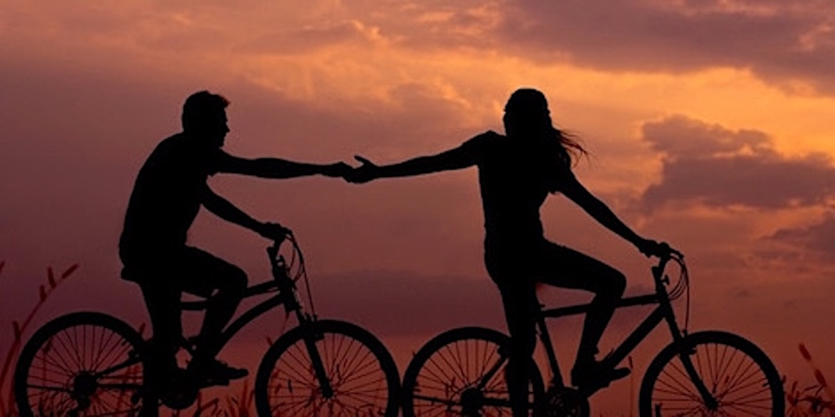 Man and woman on bicycles