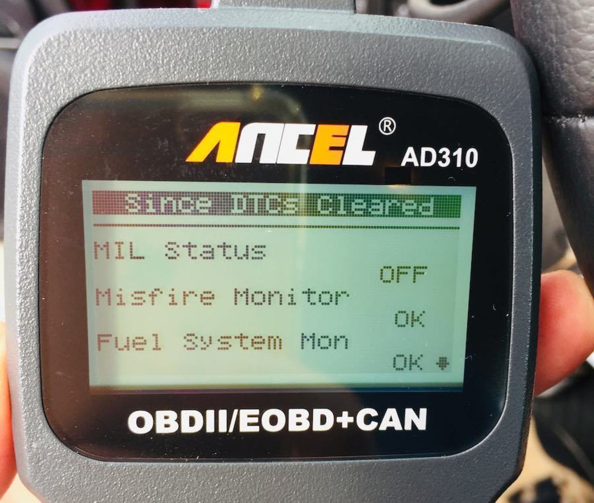 ANCEL AD310 Showing I/M Readiness status of the first three items.