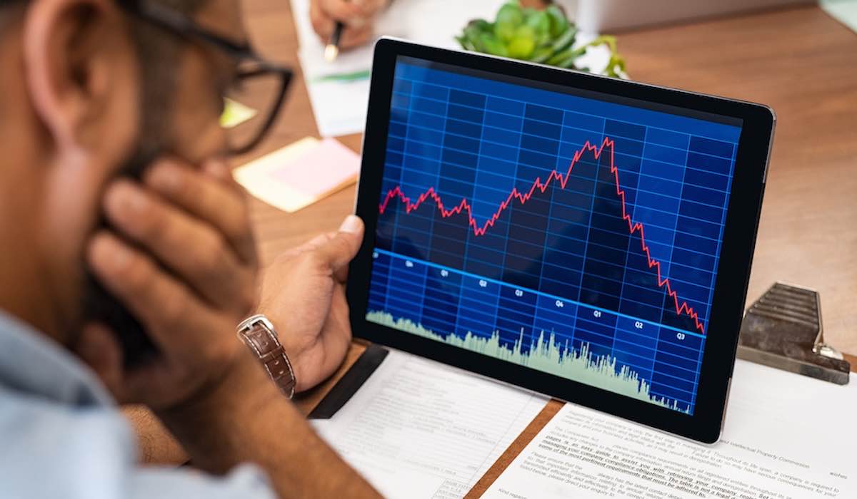 Stock trader looking at screen