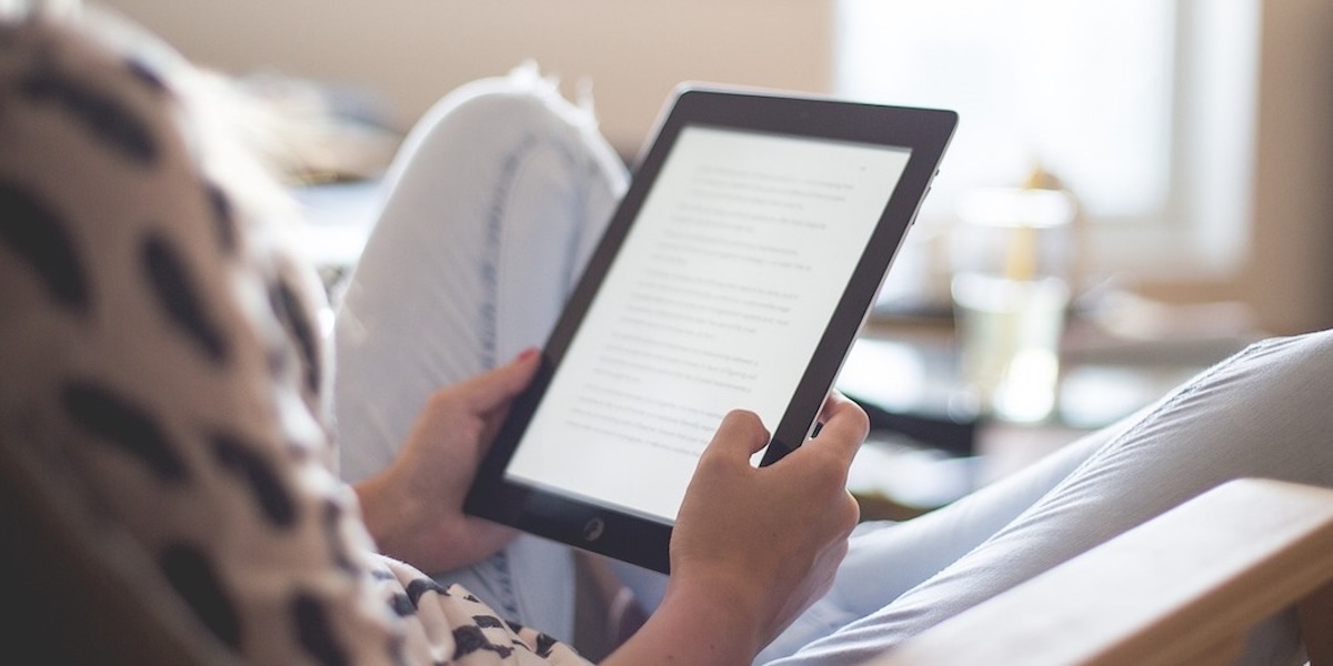 Woman reading kindle